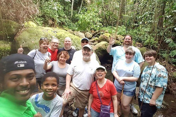 Tropical Rain Forest Explorer Hike In St. Kitts - Wing Field River and volcanic rocks underfoot